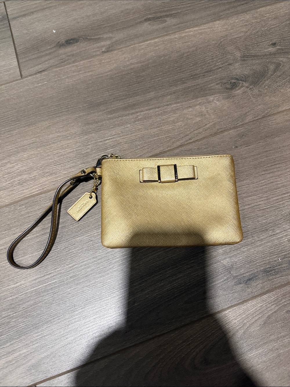 Coach Metallic Gold Wristlet Clutch with Bow Accent